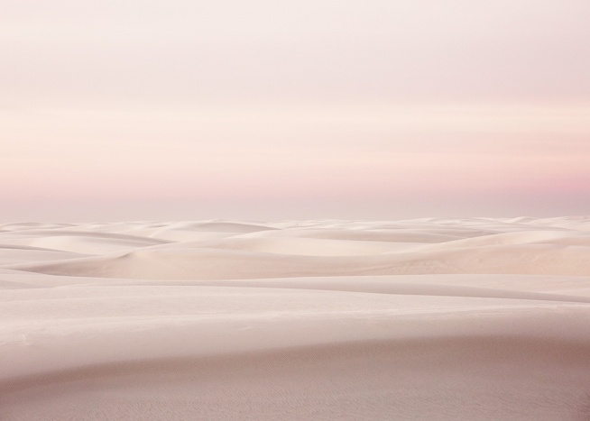 Fotografi med rosa himmel bak hvite sanddyner
