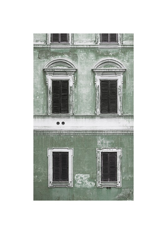  – Fotografi av en grønn fasade med vintage-følelse og svarthvite vinduer