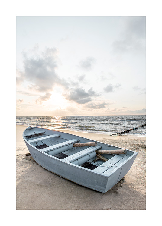 – Fotografi av en fiskebåt på stranden